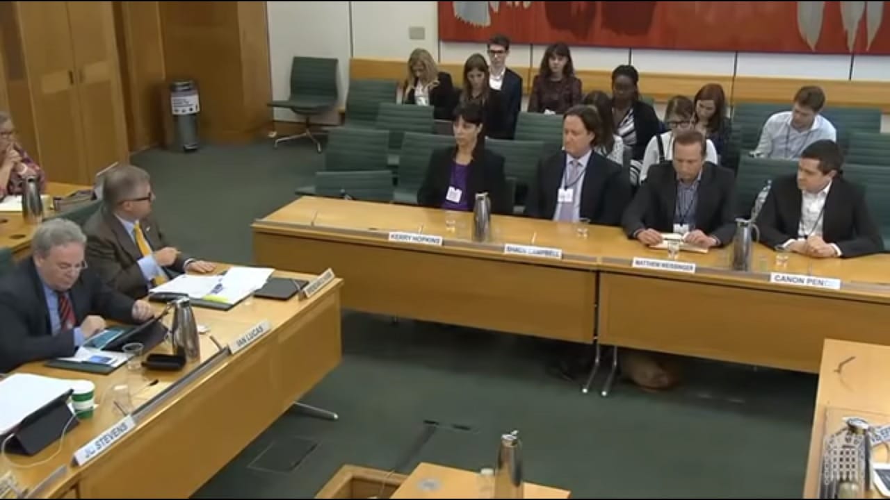 A group of people performing on a counter
Description automatically generated